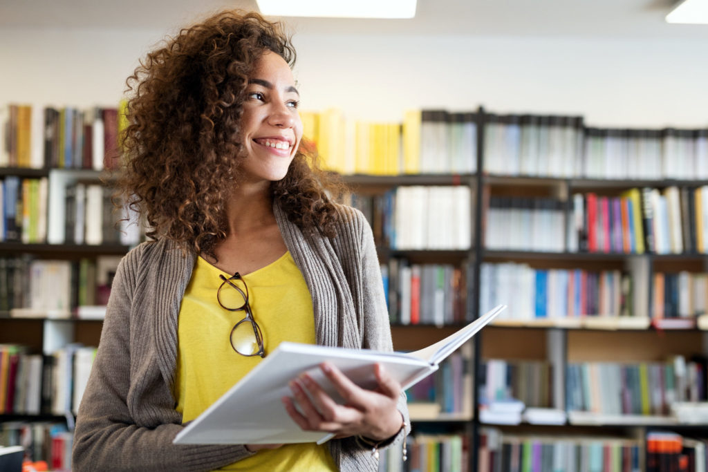 young woman at a library